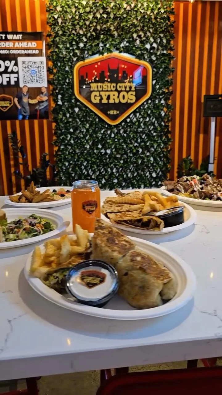 Gyro and sides served on a table